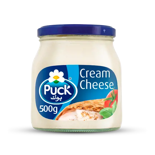 f03c89_e1c6dd68d3ad4615b82c17a358527235mv2.webp Puck Cream Cheese Spread 500g - Image 1